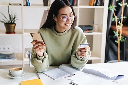 Woman holding a credit card