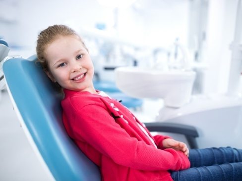 Young patient with dental sealants smiling