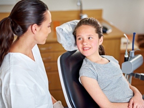Child talking to dentist after oral conscious dental sedation visit