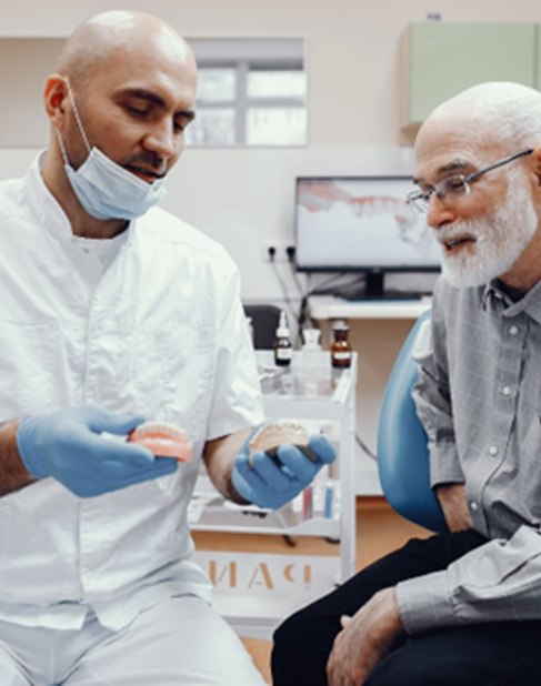 An older man getting dentures in Dallas