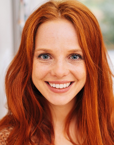 Portrait of beautiful smiling young woman