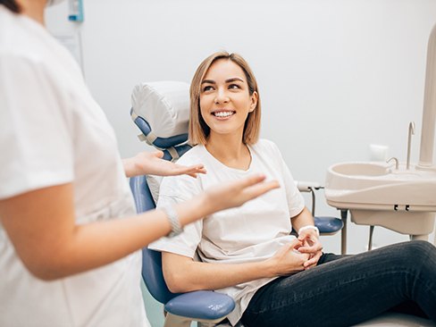 patient talking to dentist 