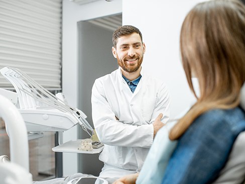 dentist talking to patient 