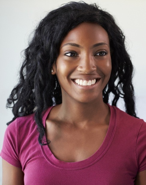 Woman with healthy smile after restorative dentistry