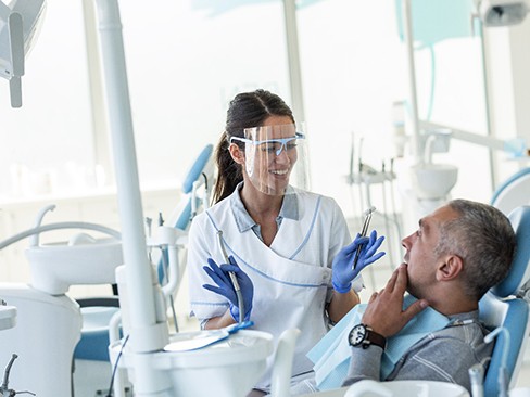Dentist explaining treatment to patient