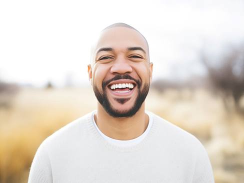 Man smiling outside