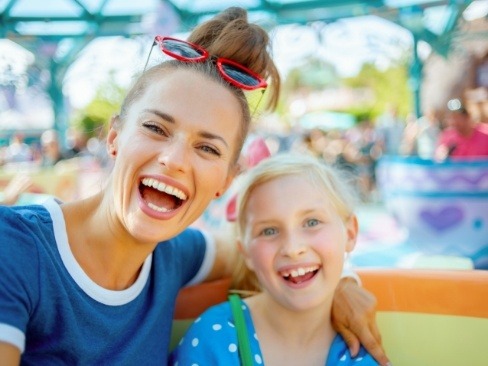 Mother and daughter enjoying the benefits of straighter teeth