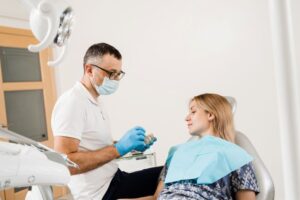 Dentist and patient talking during consultation