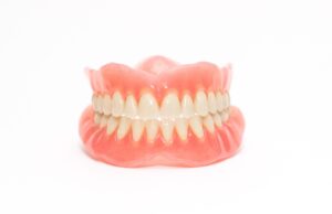 Dentures against a white background.